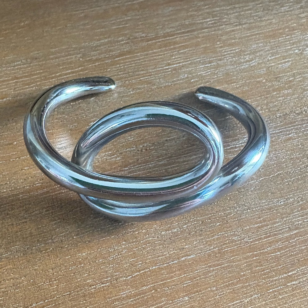 Abstract silver tone metal cuff bracelet